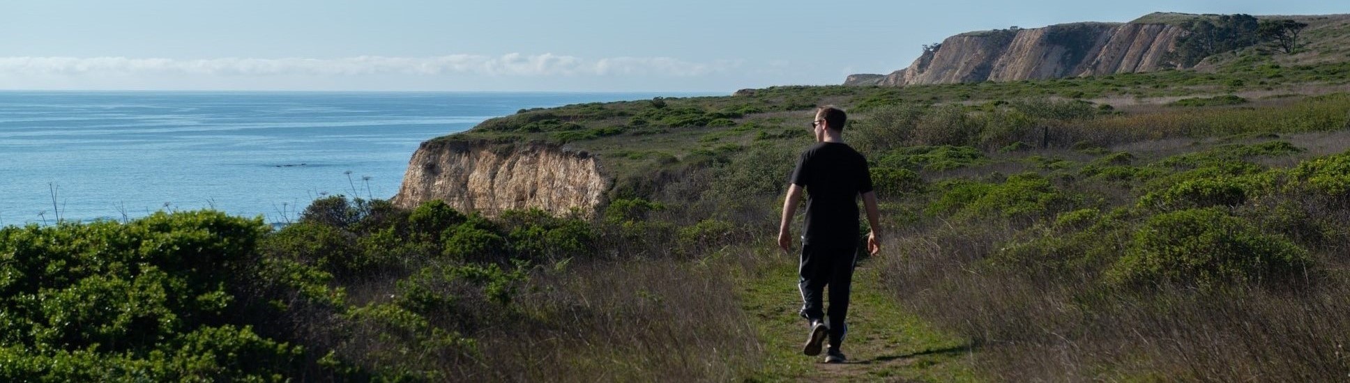 Hiker on coastal trail_cropped2 by Robin Applegarth